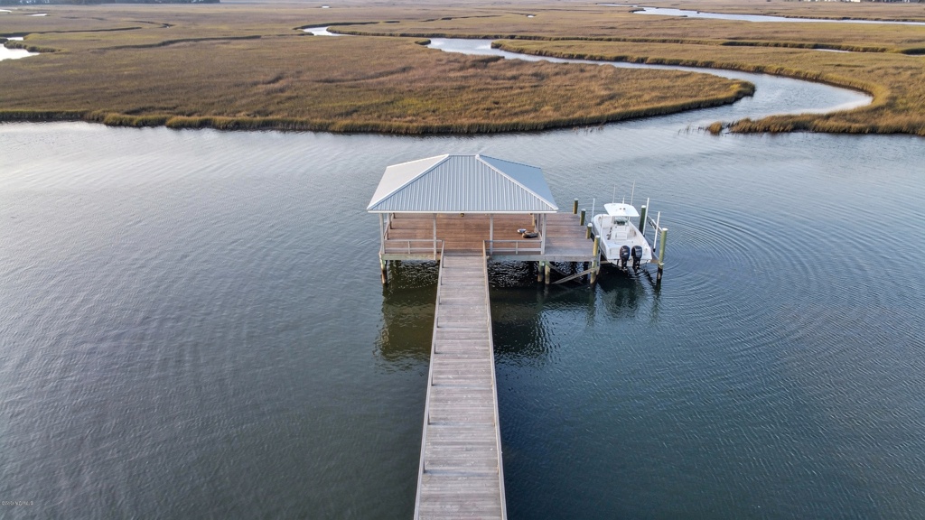 Aerial view of a T-head pier with gazebo and boat lift on the Intracoastal Waterway